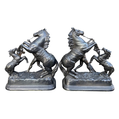 184 - PAIR OF 20TH CENTURY SPELTER GROUP OF MARLY HORSES. (h 41cm x w 35.5cm x d 17.5cm)