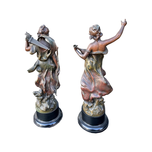 185 - AFTER AUGUSTE MOREAU, 1834 - 1917, A PAIR OF 20TH CENTURY FRENCH PATINATED BRONZED SPELTER FIGURESBo... 