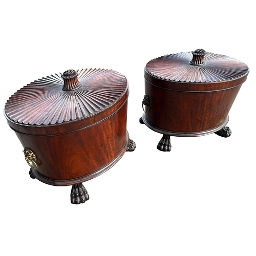 206 - A GOOD PAIR OF GEORGE III OVAL MAHOGANY CELLARETTE With gadrooned carved top fitted with lion mask r... 