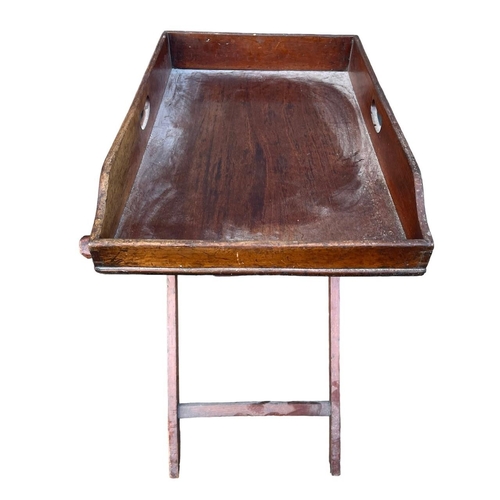 225 - A GEORGE III MAHOGANY BUTLER’S TRAY ON STAND. (h 76.5cm x d 45cm x 70.5cm)