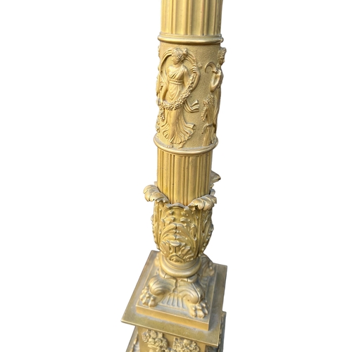 267 - A PAIR OF 19TH CENTURY FRENCH EMPIRE GILT BRONZE AND ORMOLU COLUMN LAMPS
Decorated with Grecian Godd... 