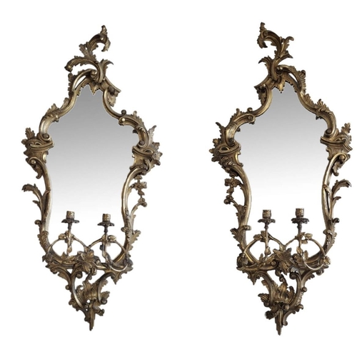 269 - A PAIR OF 19TH CENTURY GEORGE III DESIGN CARVED GILTWOOD GIRONDELLE MIRRORS
The cartouche frames dec... 