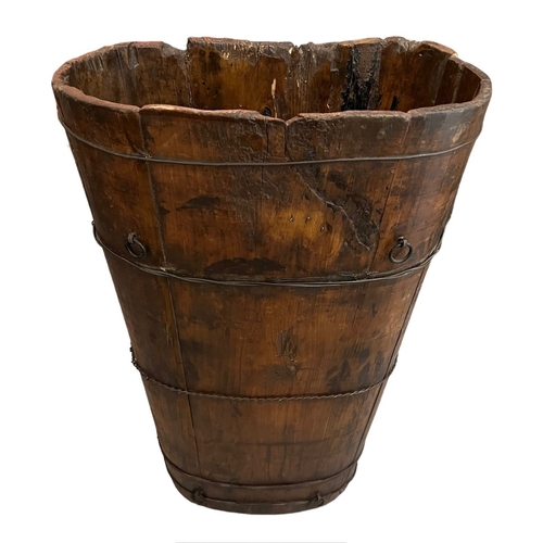 262 - A 19TH CENTURY PINE AND METAL GRAPE HARVEST HOD BARREL.
(h 76cm x d 28cm x w 48cm)