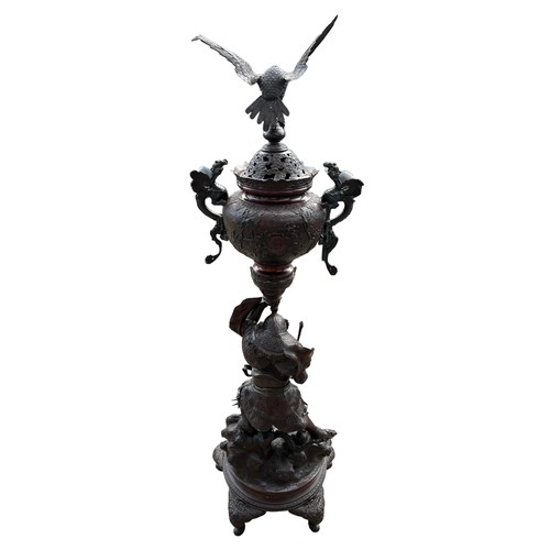 176 - AN EXTREMELY LARGE JAPANESE MEJI PERIOD BRONZE KORO (INCENSE BURNER). Raised on five scrolling feet,... 