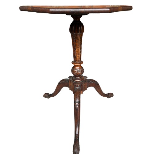 268 - A GEORGE II CARVED WALNUT TRIPOD TABLE
The octagonal top inlaid with burr wood supported on a carved... 