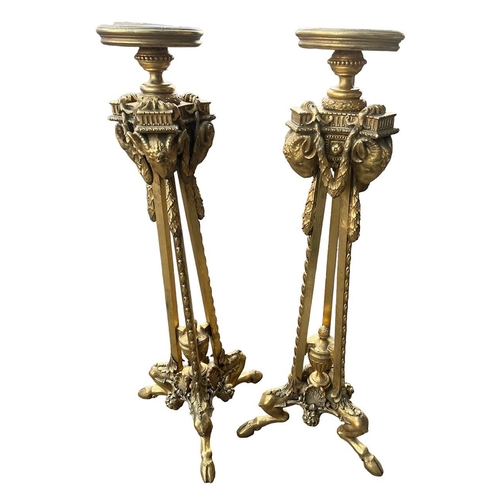 231 - MANY OF ROBERT ADAM, A PAIR OF 19TH CENTURY NEOCLASSICAL DESIGN CARVED GILTWOOD TORCHERE STANDS
The ... 