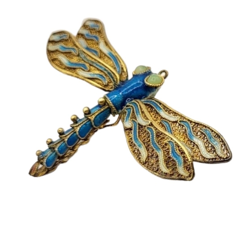 20 - A 20TH CENTURY SOUTH-EAST ASIA GILT, JADE AND ENAMEL DRAGONFLY BROOCH
Having pierced filigree wings,... 