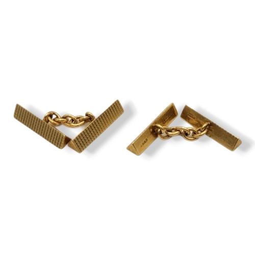 34 - A 20TH CENTURY PAIR OF 9CT GOLD TRIANGULAR PRISM CUFFLINKS
Textured finish. 
(19mm x 5mm, 10.4g)