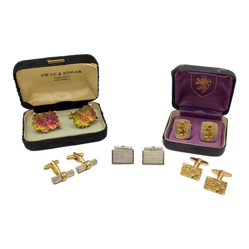 42 - SWAN & EDGAR, A PAIR OF VINTAGE GOLD PLATED AND GLASS CUFFLINKS
Together with four pairs of gold pla... 