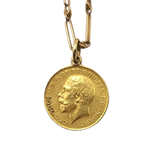 6 - A VICTORIAN 22CT GOLD HALF SOVEREIGN PENDANT, DATED 1914
Attached to a 9ct gold stylised link chain.... 