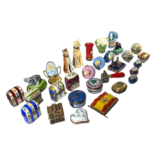 103 - LIMOGES, FRANCE, A COLLECTION OF THIRTY ‘PEINT MAIN’ TRINKET BOXES, TO INCLUDE NOVELTY EXAMPLES Comp... 