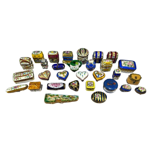 128 - LIMOGES, FRANCE, A COLLECTION OF THIRTY ‘PEINT MAIN’ TRINKET BOXES, TO INCLUDE NOVELTY EXAMPLES Comp... 