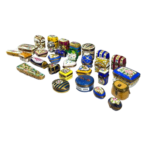 128 - LIMOGES, FRANCE, A COLLECTION OF THIRTY ‘PEINT MAIN’ TRINKET BOXES, TO INCLUDE NOVELTY EXAMPLES Comp... 