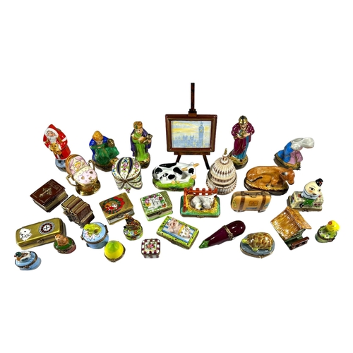 129 - LIMOGES, FRANCE, A COLLECTION OF THIRTY ‘PEINT MAIN’ TRINKET BOXES, TO INCLUDE NOVELTY EXAMPLES
Comp... 