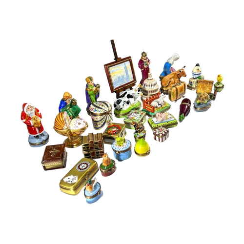 131 - LIMOGES, FRANCE, A COLLECTION OF THIRTY ‘PEINT MAIN’ TRINKET BOXES, TO INCLUDE NOVELTY EXAMPLES
Comp... 