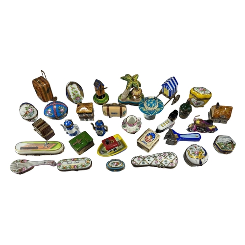 133 - LIMOGES, FRANCES, A COLLECTION OF THIRTY ‘PEINT MAIN’ TRINKET BOXES, TO INCLUDE NOVELTY EXAMPLES
Com... 