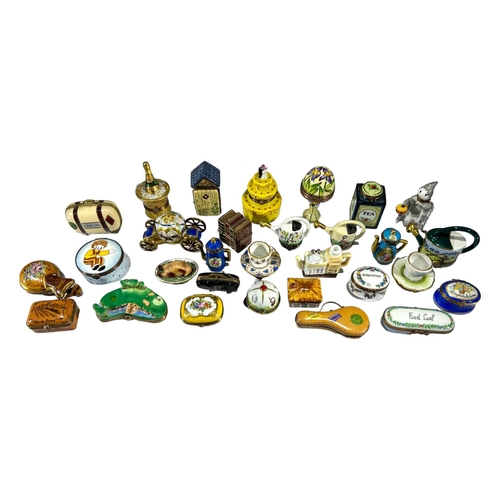 137 - LIMOGES, FRANCE, A COLLECTION OF THIRTY ‘PEINT MAIN’ TRINKET BOXES, TO INCLUDE NOVELTY EXAMPLES
Comp... 