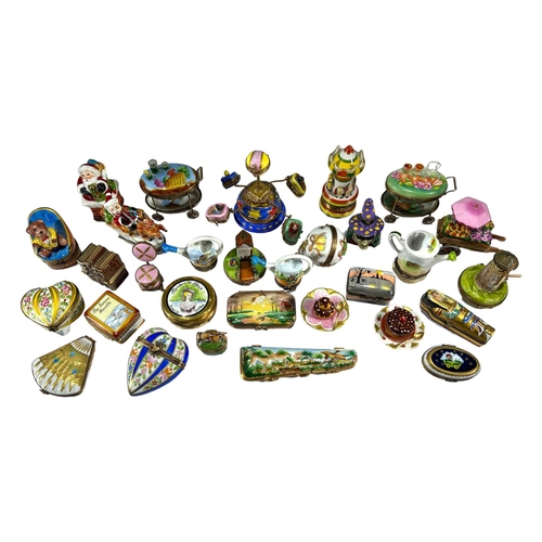 139 - LIMOGES, FRANCE, A COLLECTION OF THIRTY ‘PEINT MAIN’ TRINKET BOXES, TO INCLUDE NOVELTY EXAMPLES. Com... 