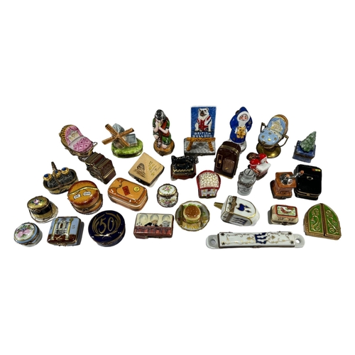 142 - LIMOGES, FRANCE, A COLLECTION OF THIRTY ‘PEINT MAIN’ TRINKET BOXES, TO INCLUDE NOVELTY EXAMPLES
Comp... 