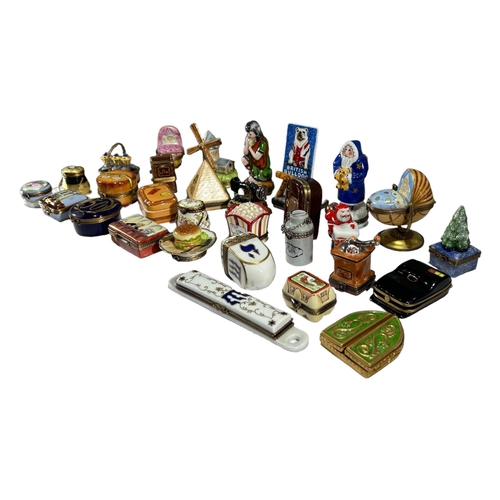 142 - LIMOGES, FRANCE, A COLLECTION OF THIRTY ‘PEINT MAIN’ TRINKET BOXES, TO INCLUDE NOVELTY EXAMPLES
Comp... 