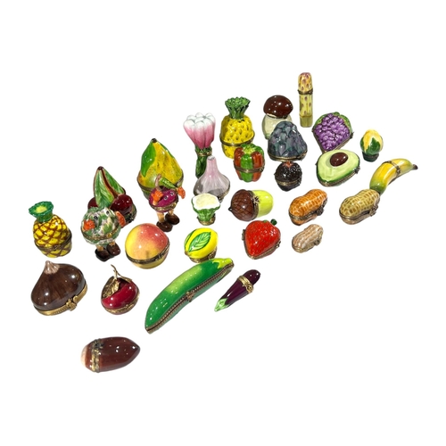 146 - LIMOGES, FRANCE, A COLLECTION OF THIRTY ‘PEINT MAIN’ FRUIT & VEGETABLE THEMED TRINKET BOXES
Comprisi... 