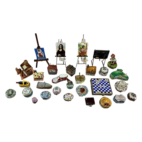 149 - LIMOGES, FRANCE, A COLLECTION OF THIRTY ‘PEINT MAIN’ TRINKET BOXES, TO INCLUDE NOVELTY EXAMPLES
Comp... 