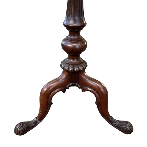 202 - MANNER OF GILLOWS, A 19TH CENTURY MAHOGANY OCCASIONAL TRIPOD TABLE
The shaped top supported on a ree... 