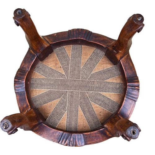 212 - GILLOWS, A 19TH CENTURY CARVED WALNUT CIRCULAR FOOTSTOOL
The upholstered top, raised on four cabriol... 