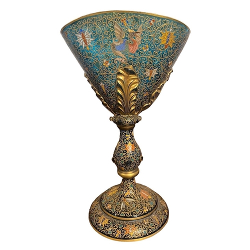 162A - A DECORATIVE MOSER BOHEMIAN ENAMELLED AND GILT GLASS GOBLET 
Decorated with mythical beast.
(h 32.5c... 