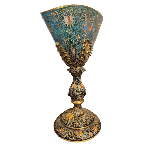 162A - A DECORATIVE MOSER BOHEMIAN ENAMELLED AND GILT GLASS GOBLET 
Decorated with mythical beast.
(h 32.5c... 