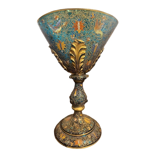 162A - A DECORATIVE MOSER BOHEMIAN ENAMELLED AND GILT GLASS GOBLET 
Decorated with mythical beast.
(h 32.5c... 