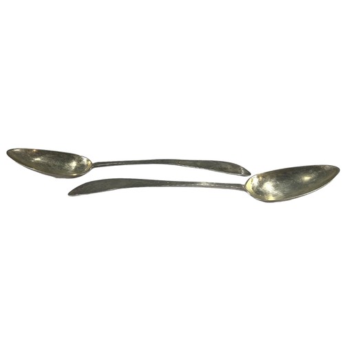 74 - A PAIR OF LATE 19TH CENTURY AMERICAN SILVER SERVING SPOONS
Having decorative chased terminals, punch... 