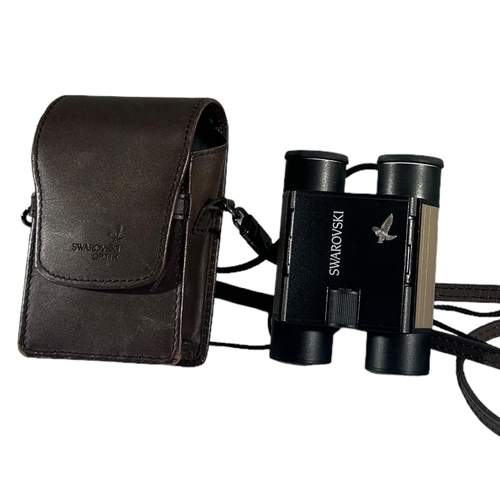 164 - AUSTRIAN SWAROVSKI OPTIK POCKET BINOCULARS AND LEATHER CARRY CASE, 8X20B.
(9.4cm x 10cm)