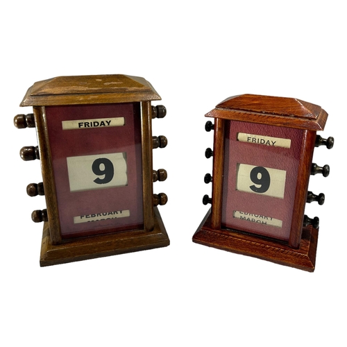 167A - TWO ART DECO PERIOD WOODEN PERPETUAL DESK CALENDARS. 
(largest 17cm)