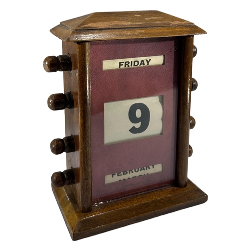 167A - TWO ART DECO PERIOD WOODEN PERPETUAL DESK CALENDARS. 
(largest 17cm)