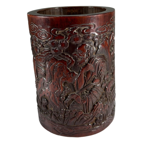 183A - A 19TH CENTURY CHINESE CARVED BAMBOO BRUSH POT
Decorated with figures amongst foliage and mountainou... 