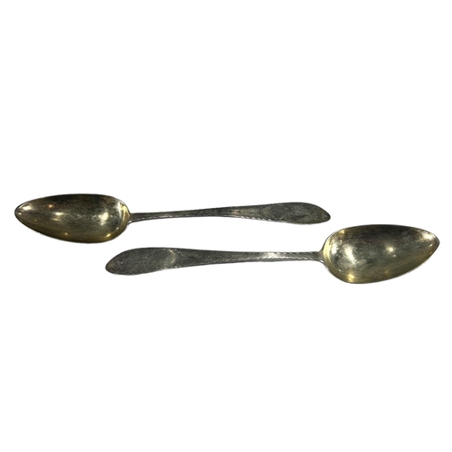 74 - A PAIR OF LATE 19TH CENTURY AMERICAN SILVER SERVING SPOONS
Having decorative chased terminals, punch... 