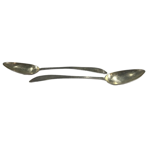 74 - A PAIR OF LATE 19TH CENTURY AMERICAN SILVER SERVING SPOONS
Having decorative chased terminals, punch... 