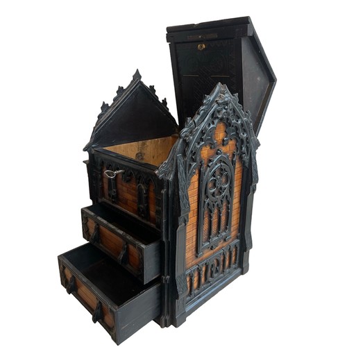 169A - A 19TH CENTURY CONTINENTAL ARCHITECTURAL GOTHIC DESIGN JEWELLERY BOX
The roof with hinged lid above ... 