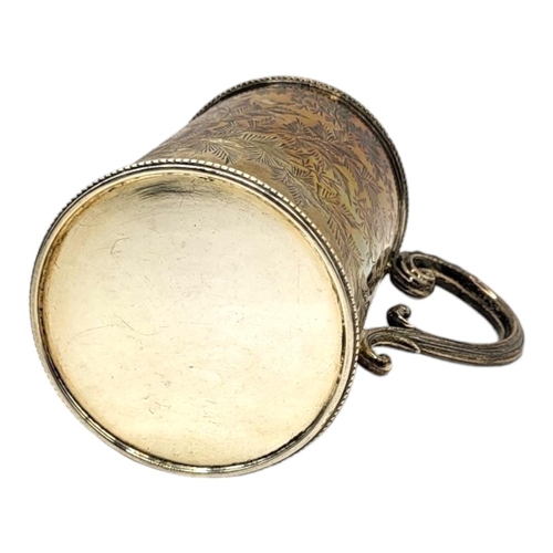31 - WILLIAM HUTTON & SONS, A VICTORIAN SILVER MUG, HALLMARKED LONDON, 1887
Chased fern leaf decoration, ... 