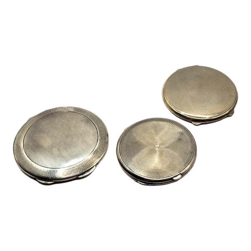 40 - HARRODS LTD, AN ART DECO MIRRORED SILVER COMPACT, HALLMARKED LONDON 1939. TOGETHER WITH TWO OTHER AR... 