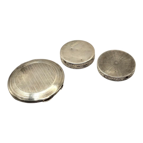 43 - A COLLECTION OF THREE EARLY 20TH CENTURY CONTINENTAL SILVER COMPACTS
Comprising a chased and engrave... 