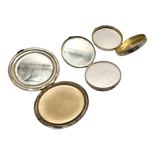 43 - A COLLECTION OF THREE EARLY 20TH CENTURY CONTINENTAL SILVER COMPACTS
Comprising a chased and engrave... 