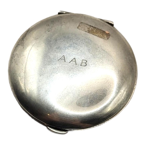 44 - R. BLACKINTON & CO. FOR CARTIER, A LATE 1940’S AMERICAN STERLING SILVER COMPACT
Circular form with p... 