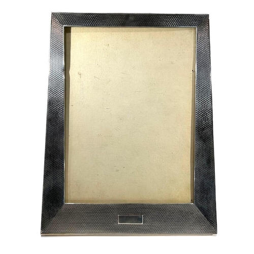 15 - SANDERS & MACKENZIE, AN ART DECO SILVER FRONTED PICTURE FRAME, HALLMARKED BIRMINGHAM, 1926
Trapezoid... 