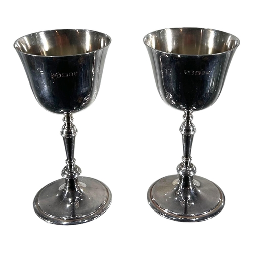 20 - CARRINGTON & CO., A SET OF FOUR SILVER GOBLETS, HALLMARKED LONDON, 1966 & 1969
Reeded stem decoratio... 