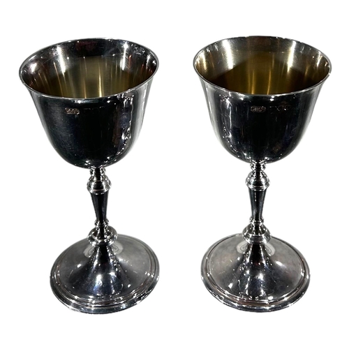 20 - CARRINGTON & CO., A SET OF FOUR SILVER GOBLETS, HALLMARKED LONDON, 1966 & 1969
Reeded stem decoratio... 