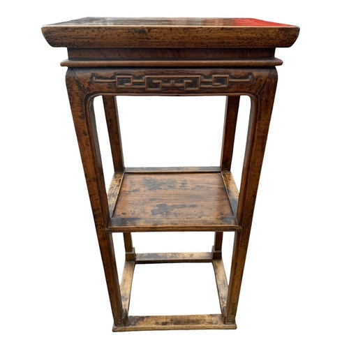 10 - THREE CHINESE HARDWOOD ITEMS
To include a carved two tier stand, hat chair and small table.
(stand 8... 