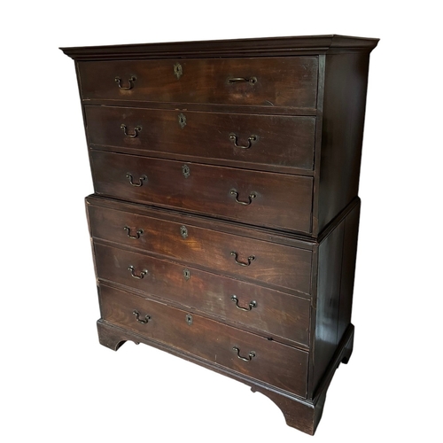 30 - A GEORGE III MAHOGANY CHEST ON CHEST
Of six long drawers fitted with swan neck handles, raised on br... 