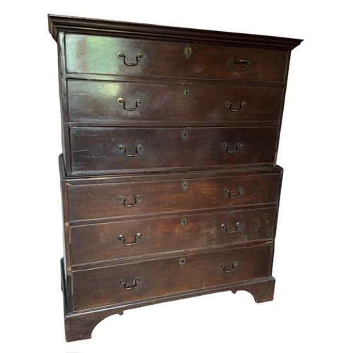 30 - A GEORGE III MAHOGANY CHEST ON CHEST
Of six long drawers fitted with swan neck handles, raised on br... 